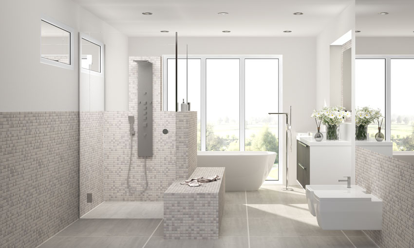 Salle de bain avec éléments de maçonnerie, carrelage en mosaïque beige.