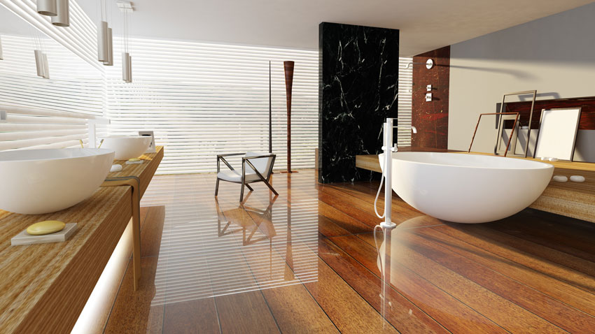 Salle de bains moderne avec plan vasque en bois et sol effet bois, baignoire design blanche.
