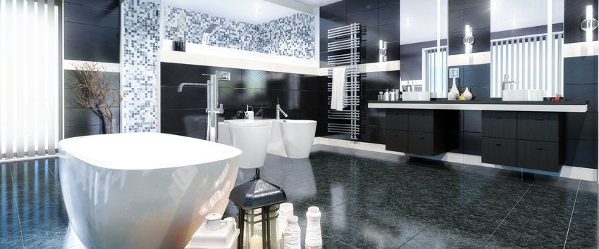 Salle de bain moderne avec carrelage et meubles noirs, mosaïque dans la douche. 