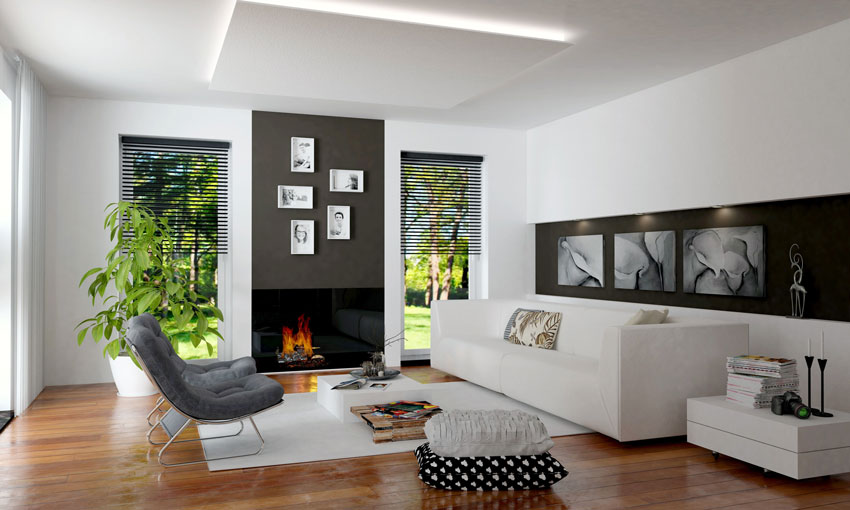 Salon avec mobilier moderne, parquet et belle cheminée.